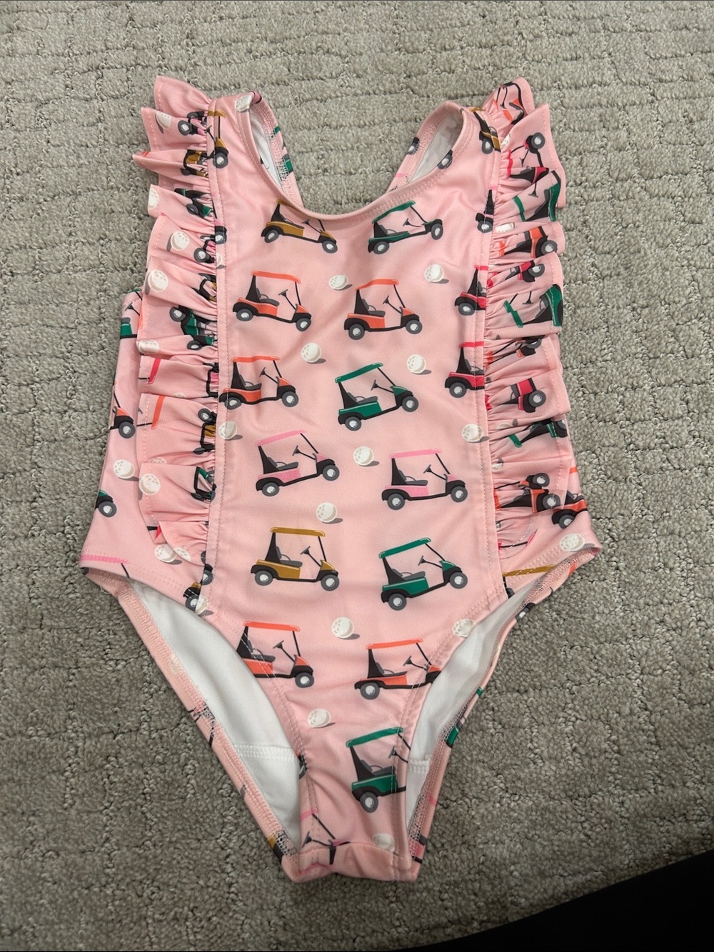 Kids Pink Ruffle One-Piece Swimsuit with Golf Cart Print